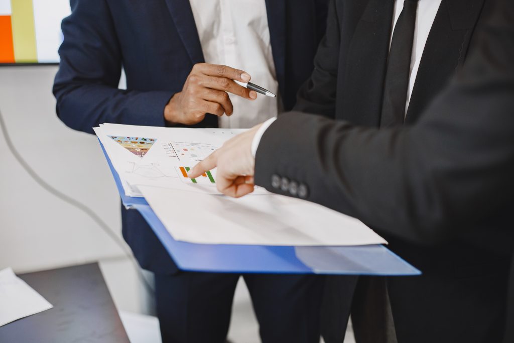 three busines partners men in the office